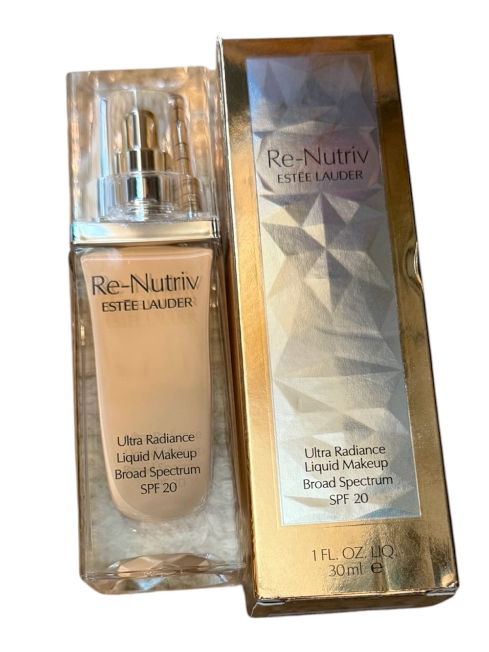 ESTEE LAUDER RE-NUTRIV ULTRA RADIANCE FOUNDATION SPF 20 1W0 WARM PORCELAIN NIB